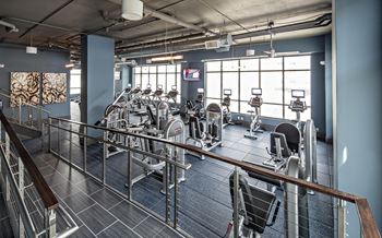 the fitness center at Reveal Hackensack apartments